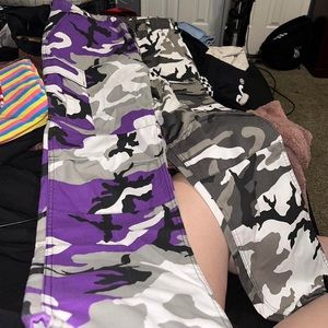 Purple and grey camo pants
Never worn